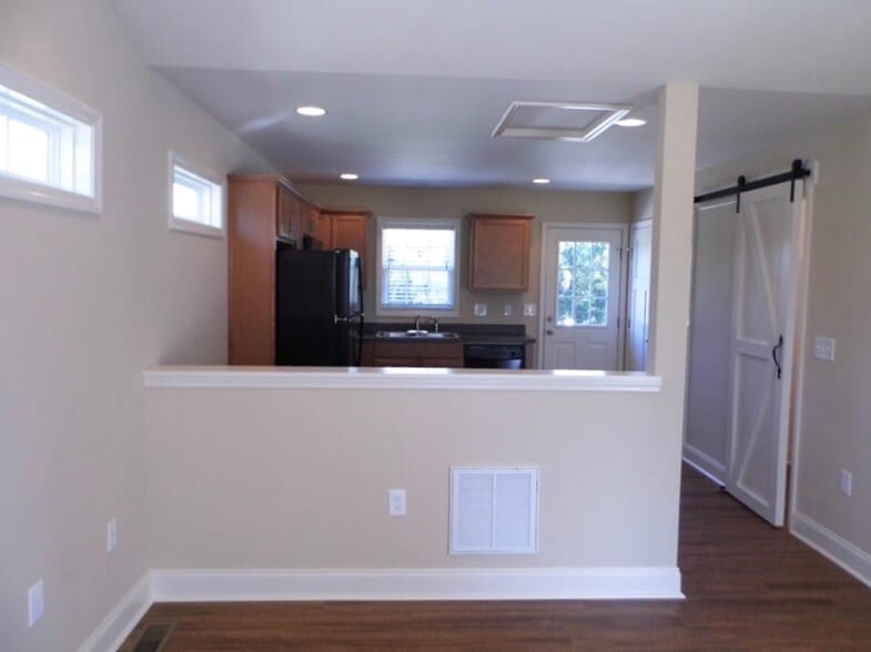 Family room opens to kitchen - 2312-A Belle Ave NE