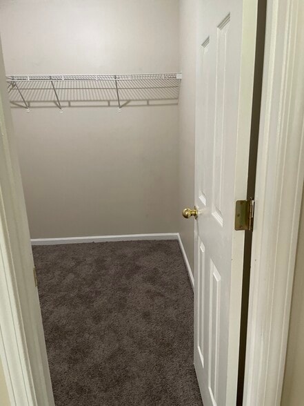 Primary Bedroom Walk-in Closet - 1314 Bradley Daniel Blvd