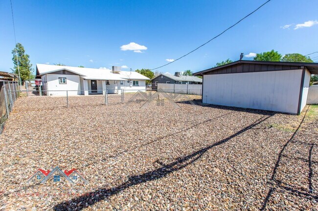 Building Photo - 6415 E Aspen Ave