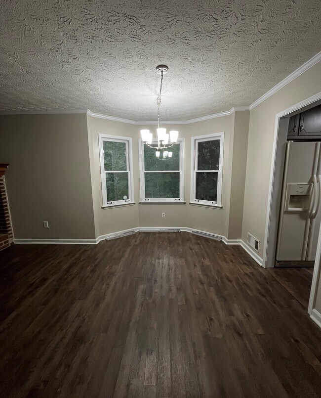 Dining area - kitchen to right and living room to left - 440 Williamsburg Way