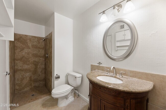 Building Photo - 8520 E Roma Ave