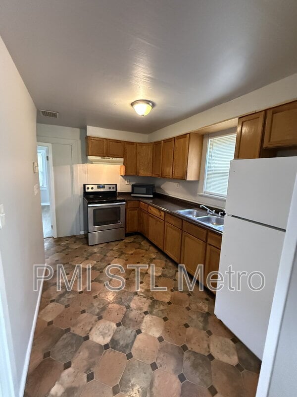 Building Photo - 6170 Emerald Ave