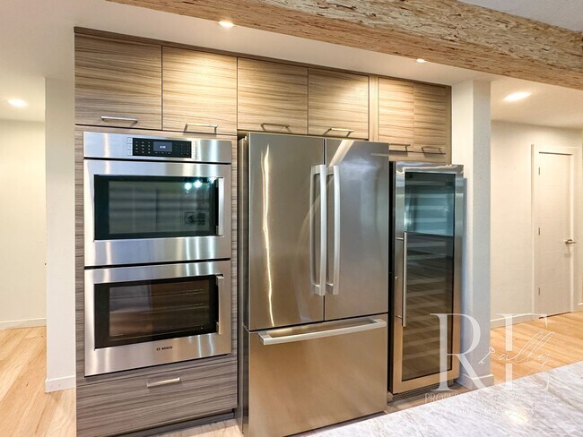 Building Photo - Mid-Century Modern Dream Home with Chef’s ...