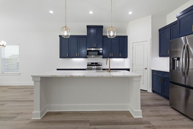 Building Photo - "New Construction 3-2-2 Home with Designer Touches Throughout!"