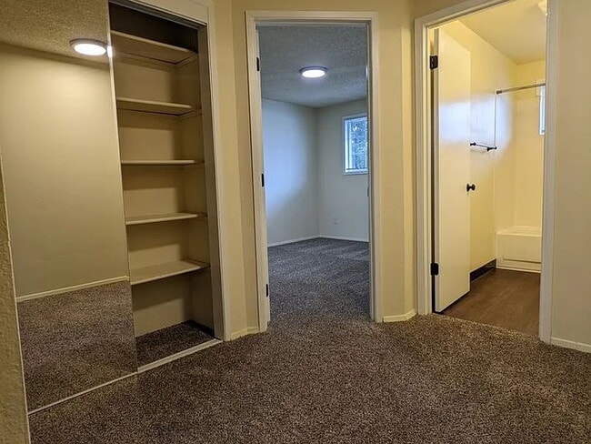 Building Photo - Available Now! Pet-Friendly 2 Bed/ 1.5 Bath with Patio & Parking