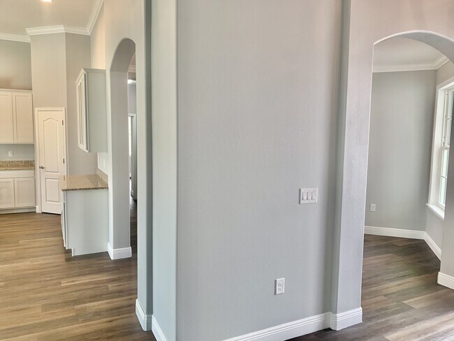 Building Photo - "Spacious 4-Bedroom 3-Bath with In-Law Suite & Granite Finishes in Palm Bay!"