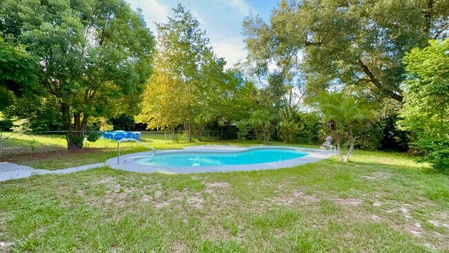 Building Photo - Your DeLand Escape: 4 Bedrooms + Pool at G...