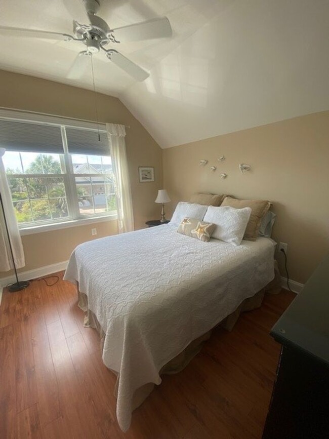 Building Photo - Nicely furnished garage apartment in gated...