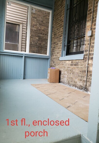 First floor, enclosed rear porch - 912 W Newport Ave