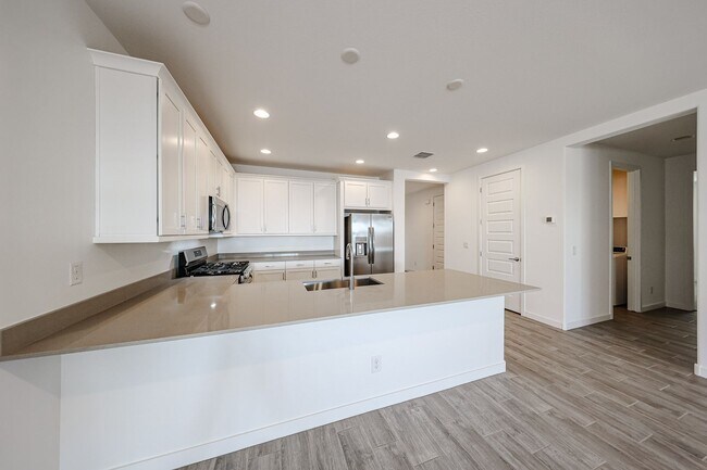 Building Photo - COMING SOON!! Recently built 5-Bedroom Home in Goodyear with Upgrades & Resort-Style Amenities