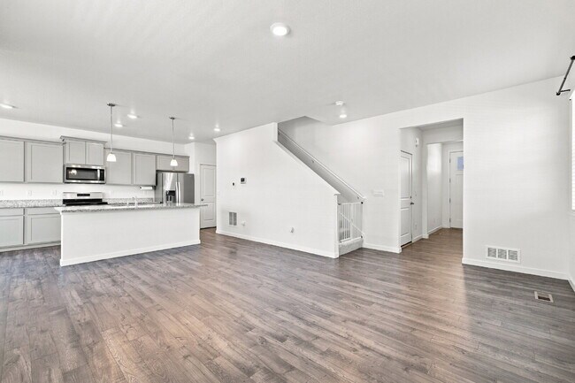 Building Photo - Spacious 4 Bedroom, 2.5 Baths in Bennett! 3 Car Attached Garage. Corner Lot!