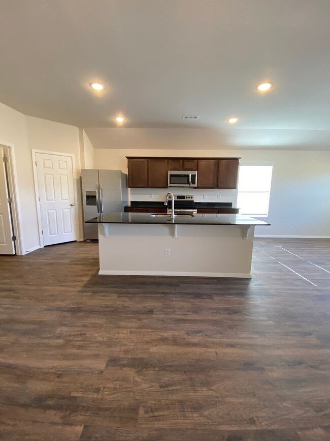 Building Photo - ***MARCH MADNESS SAVINGS!*** Four Bedroom ...