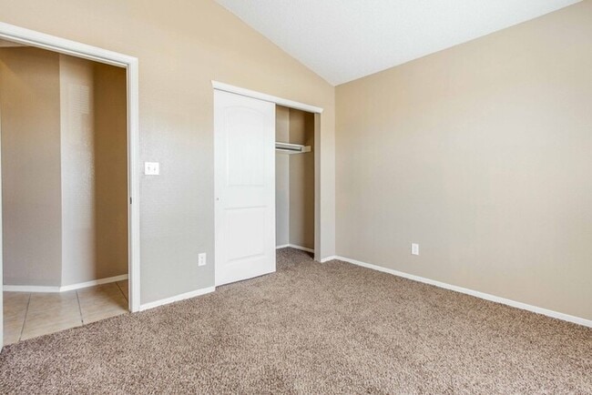 Building Photo - Charming Santa Fe style home in Tierra Del Este Subdivision.