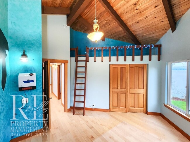 Building Photo - MOVE-IN SPECIAL: 50% OFF FIRST MONTHS RENT - Waterfront Rustic Retreat with Vaulted Ceilings, Pic...