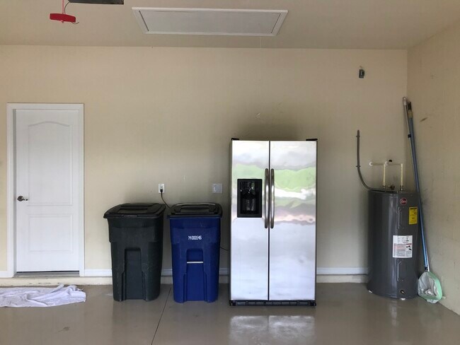 Extra Fridge in Garage - 10510 Yorkstone Dr