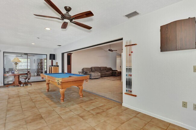 Building Photo - BEAUTIFUL 2 BEDROOM 2 BATHROOM + A DEN VILLA WITH GORGEOUS LAKE VIEWS!