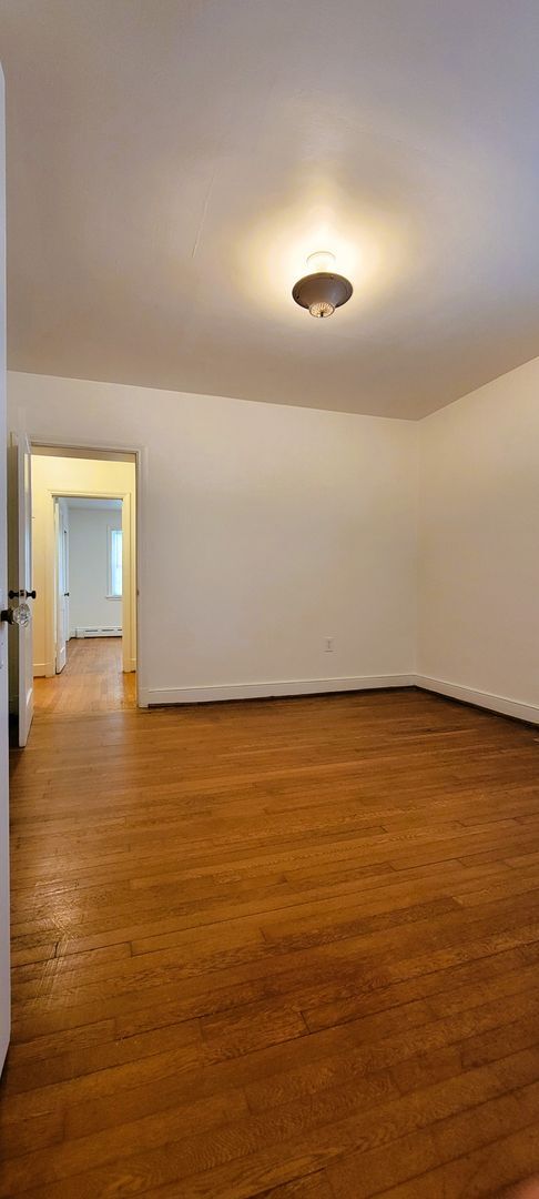Building Photo - Remodeled brick bungalow with 1st floor li...