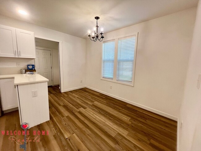 Building Photo - 4 bedroom home with air conditioning - Great location!!!  HUGE basement for your man cave or she ...