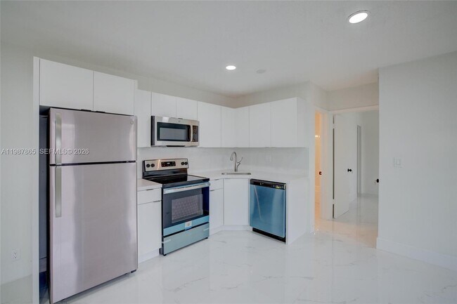 Building Photo - 1750 NE 56th Ct