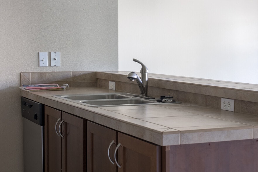 Kitchn sink with waste disposal - 15054 NW Central Dr