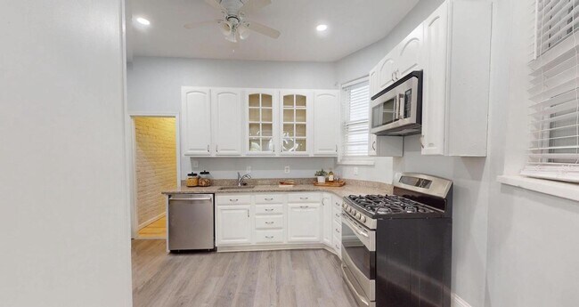 Building Photo - Extraordinary Columbia Heights Opportunity | Spacious 5BR + 2 Den Home with Off-Street Parking