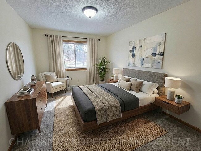 Building Photo - 4 BD, 2 BA - FENCED IN YARD, PRIVATE TRAILS, FINISHED UPPER AND LOWER LIVING AREAS, ATTACHED GARAGE!