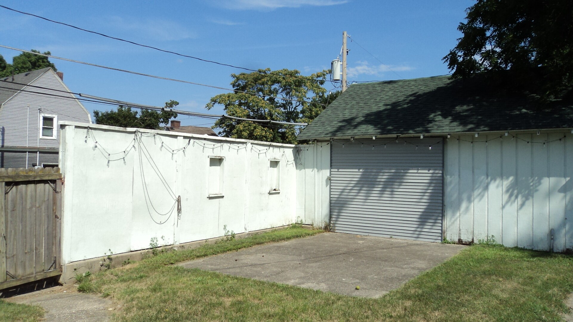 private backyard with patio - 117 E Suttenfield St