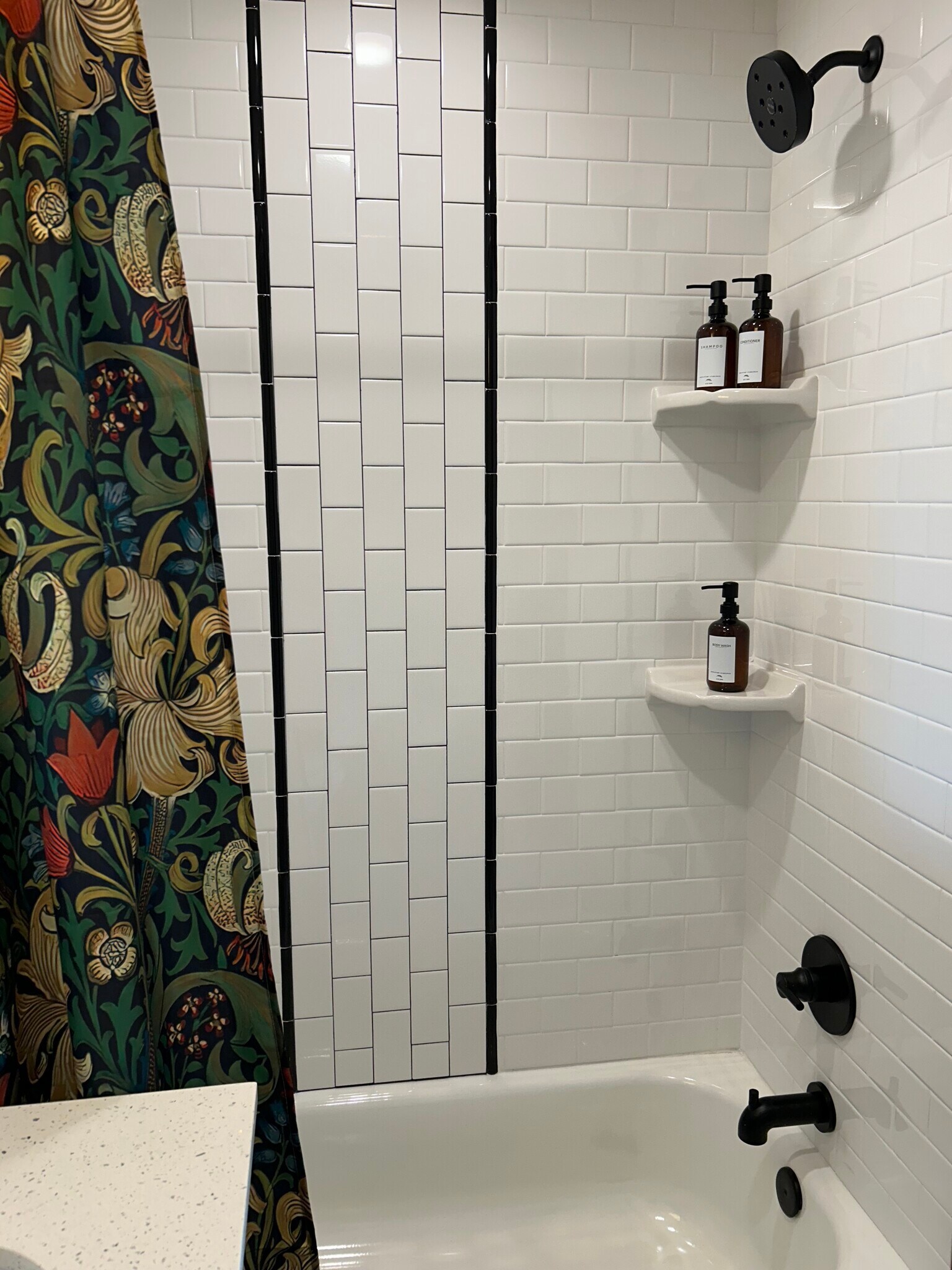 Soak in the tub or take a shower in our designer look tiled tubs - 221 E College St