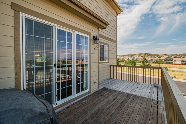 Building Photo - Spacious 5BD, 4BA Castle Rock Home with Fi...