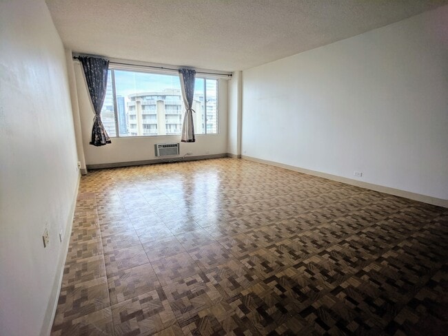 Building Photo - Spacious partly furnished Studio with electric/water utilities and no parking at Pacific Grand