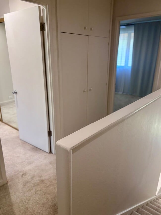 Building Photo - Available Now | 2 Bedroom, 2 Bathroom Townhouse with 1 Assigned Parking Stall at Tropic Gardens 1