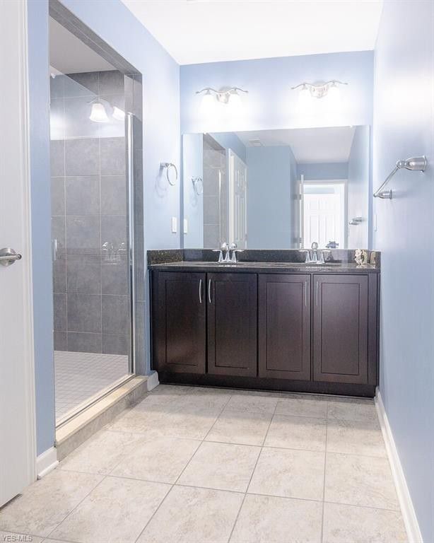 Double vanities in master bath. - 1263 W 74th St.