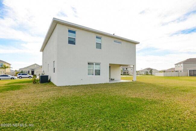 Building Photo - 10976 SW Tessili Wy