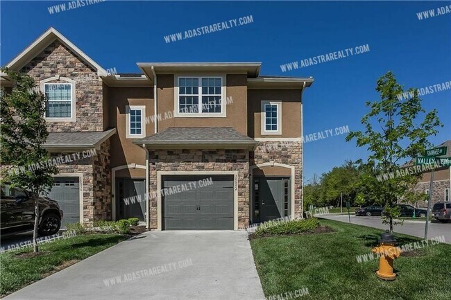Primary Photo - Like New Blue Valley Townhome-Available NOW!!
