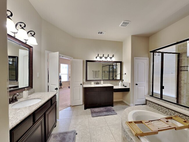 Building Photo - A Stone Hollow Showstopper: Grand Design, Gourmet Kitchen & Outdoor Living