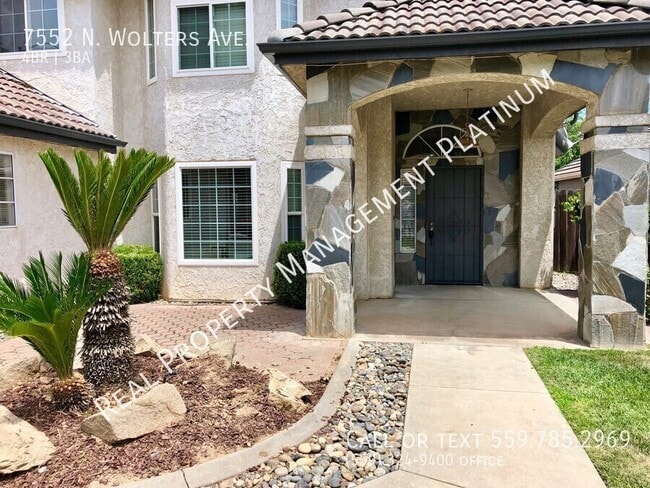 Building Photo - 7552 N Wolters Ave