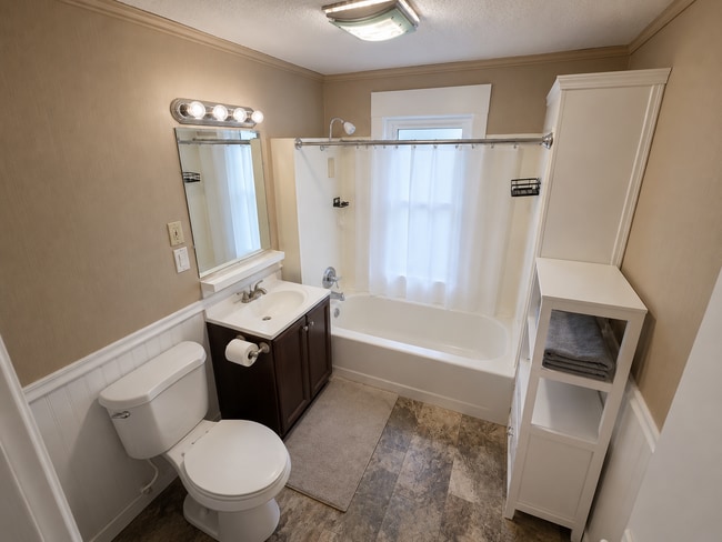 Building Photo - Available July 1st! Single family home with fenced-in backyard!