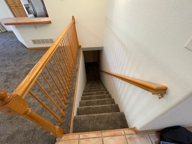 stairsway to finished basement - 5305 W 11th Street Rd