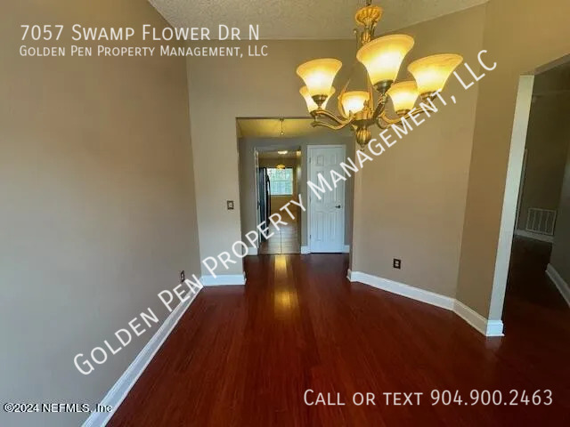 Building Photo - 7057 Swamp Flower Dr N