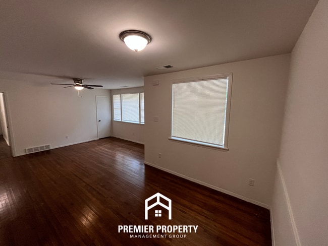 Building Photo - Spacious 3BR/2BA Home with Den & Living Room | Brick Fireplace & Large Yard