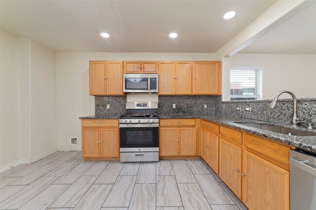 Building Photo - 8418 Village Rose Ln