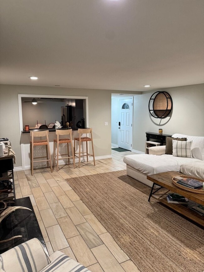 Building Photo - Charming 2-Bedroom, 1.5-Bath Apartment with Private Yard and 1 Car Garage