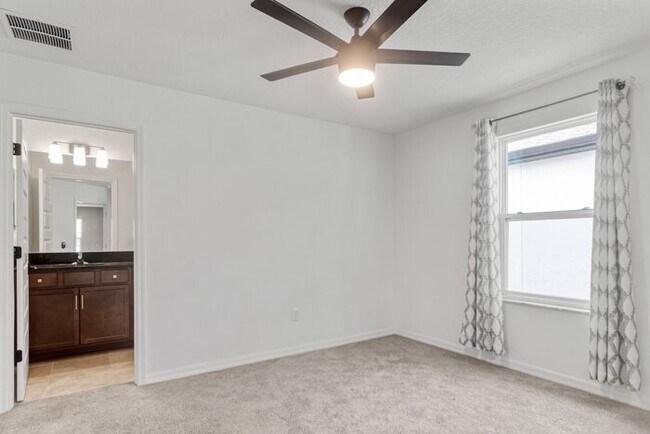 Building Photo - Discover luxury living in the gated Whispe...