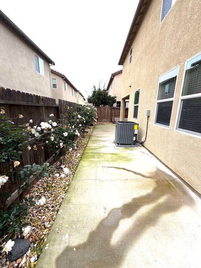 Building Photo - Spacious 5BR + Loft in Hamptons Village – Studio Suite, New HVAC, EV Charging