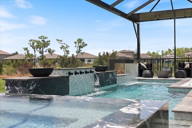 Building Photo - Luxury Home w/ Pool, Outdoor Kitchen, Car Lift, & Water View In Parrish!