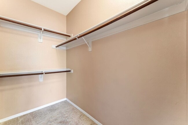 Building Photo - Bright & Stylish Condo with Fireplace and Private Balcony in a Resort-Style Community!