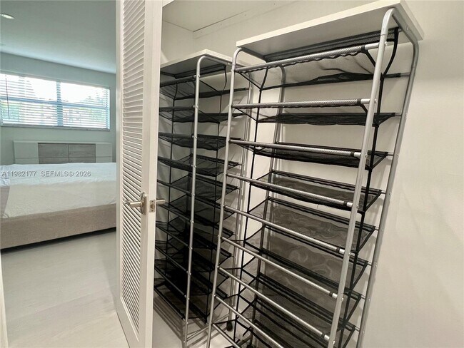 Building Photo - 8595 Sunrise Lakes Blvd