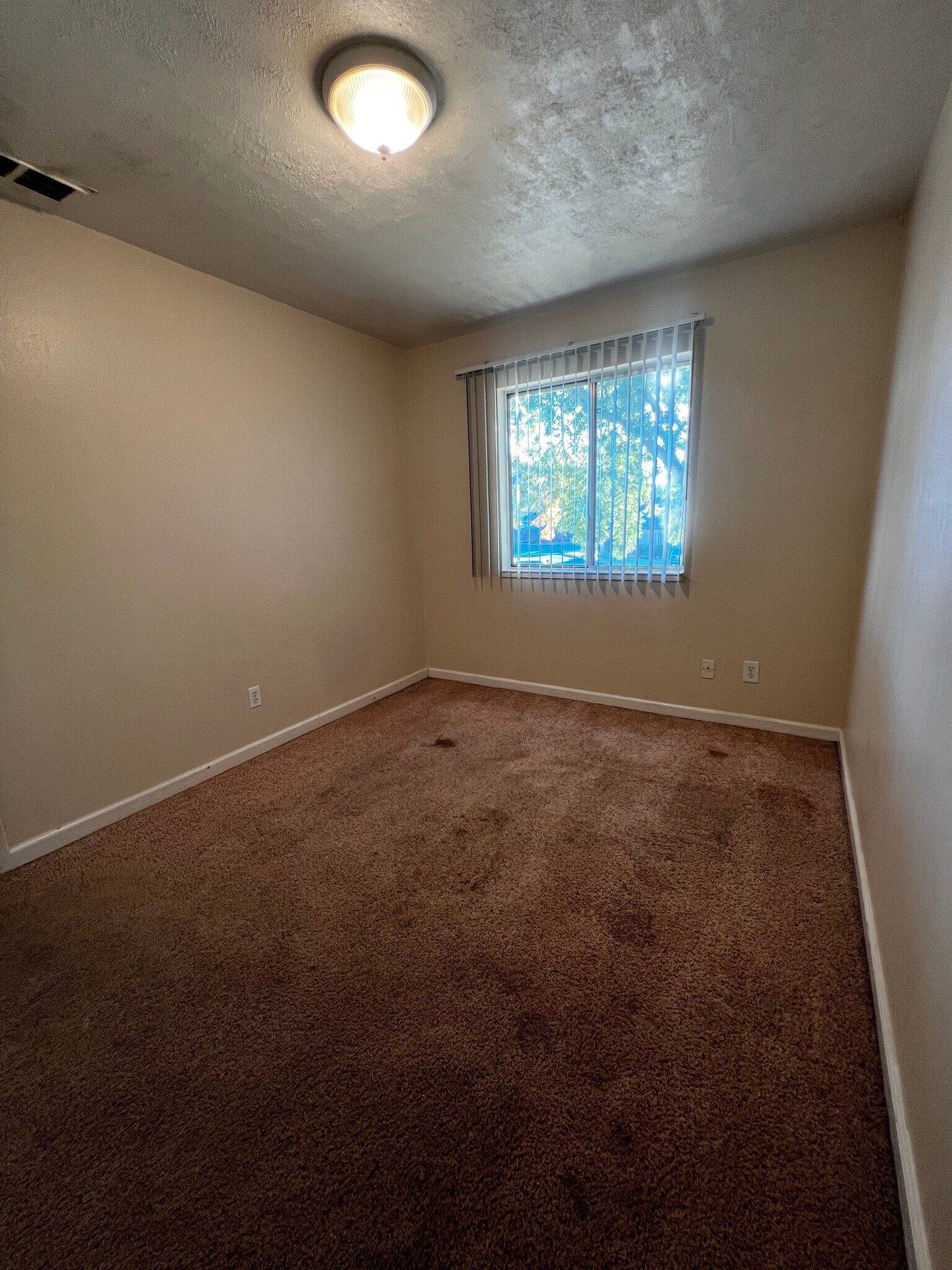 Guest bedroom overlooks parking lot - 888 Rutledge Dr