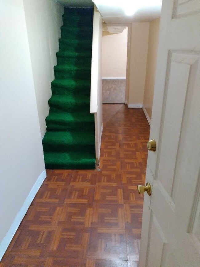 Building Photo - 3 bedrooms on the 3rd Floor with Central Hot Air, and an Available backyard