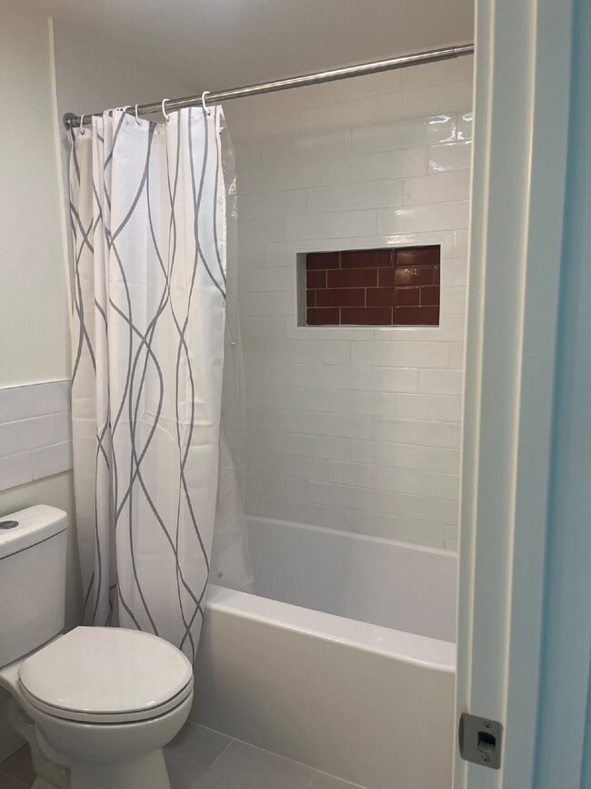 Building Photo - "Charming 4-Bedroom Coastal Retreat with 2 Baths"